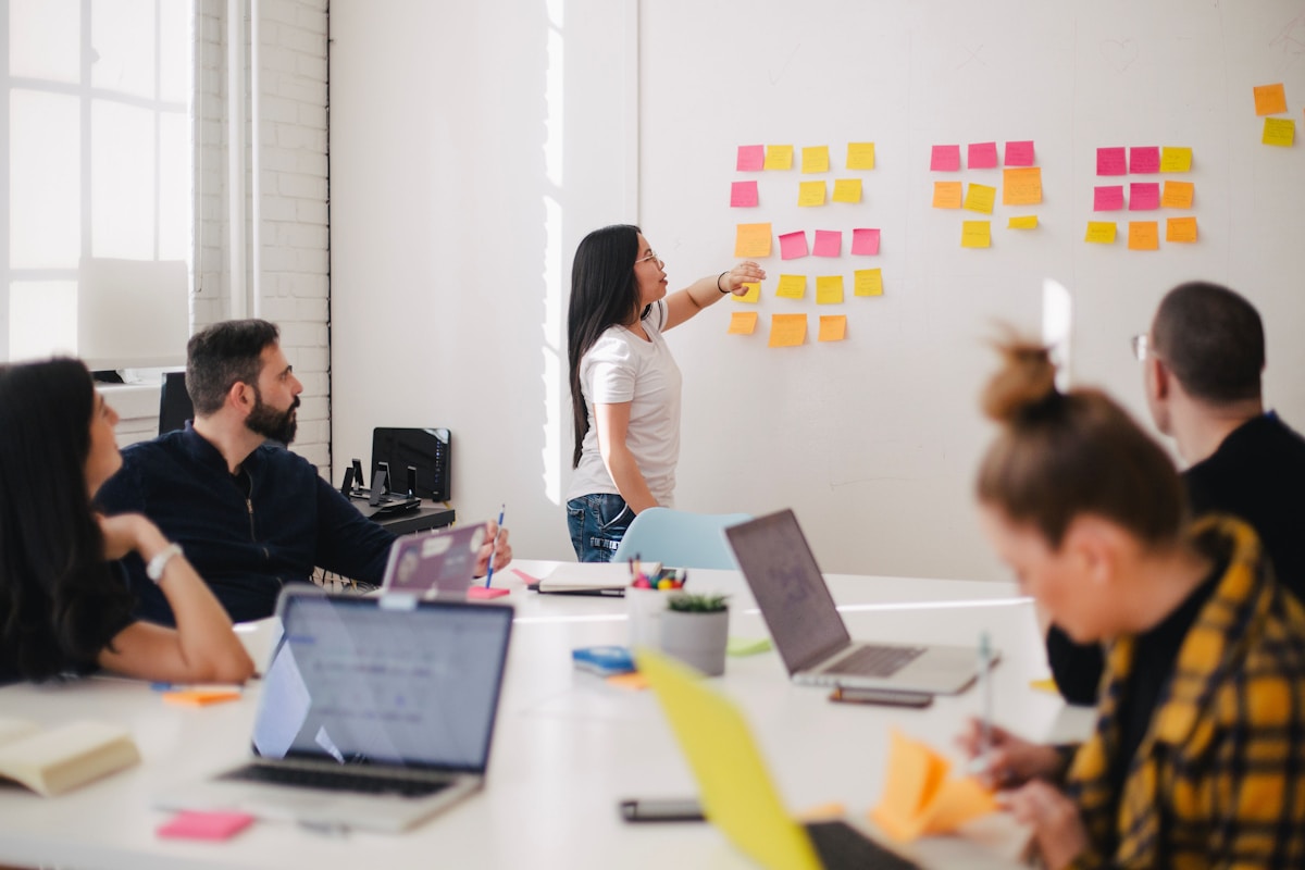 Digital marketing team discussing client strategy